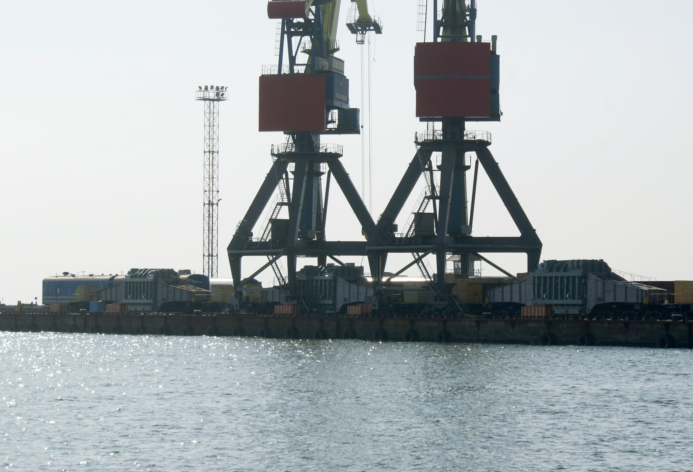 Two-jib floating crane in the roads off the port of Mariupol
